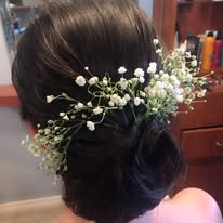 Elegant Bridal Updo with Baby's Breath